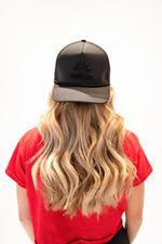 Melan Black Out Trucker Hat